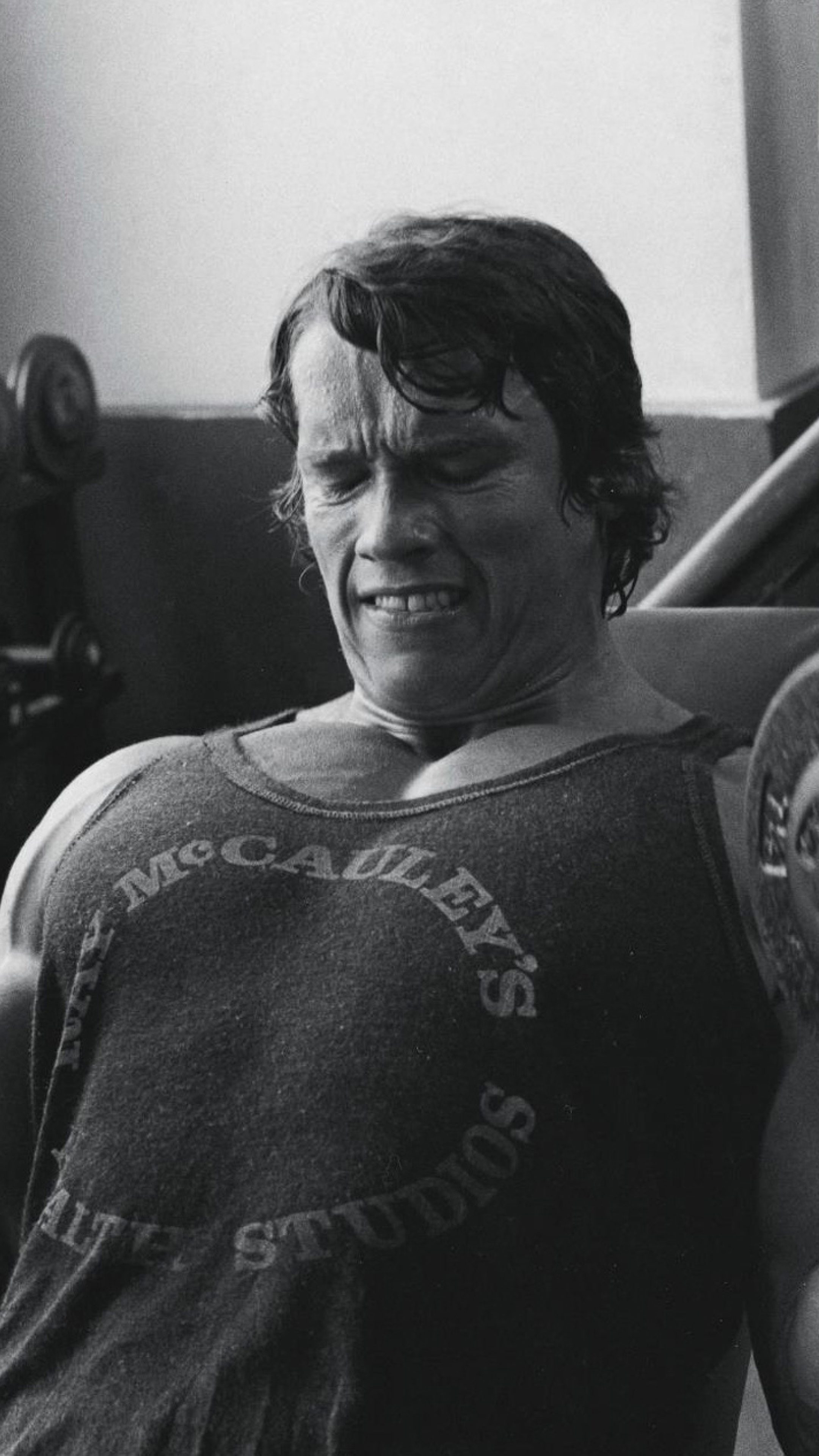 Arnold Schwarzenegger In Gym Photos (2160x3840) Resolution Wallpaper.