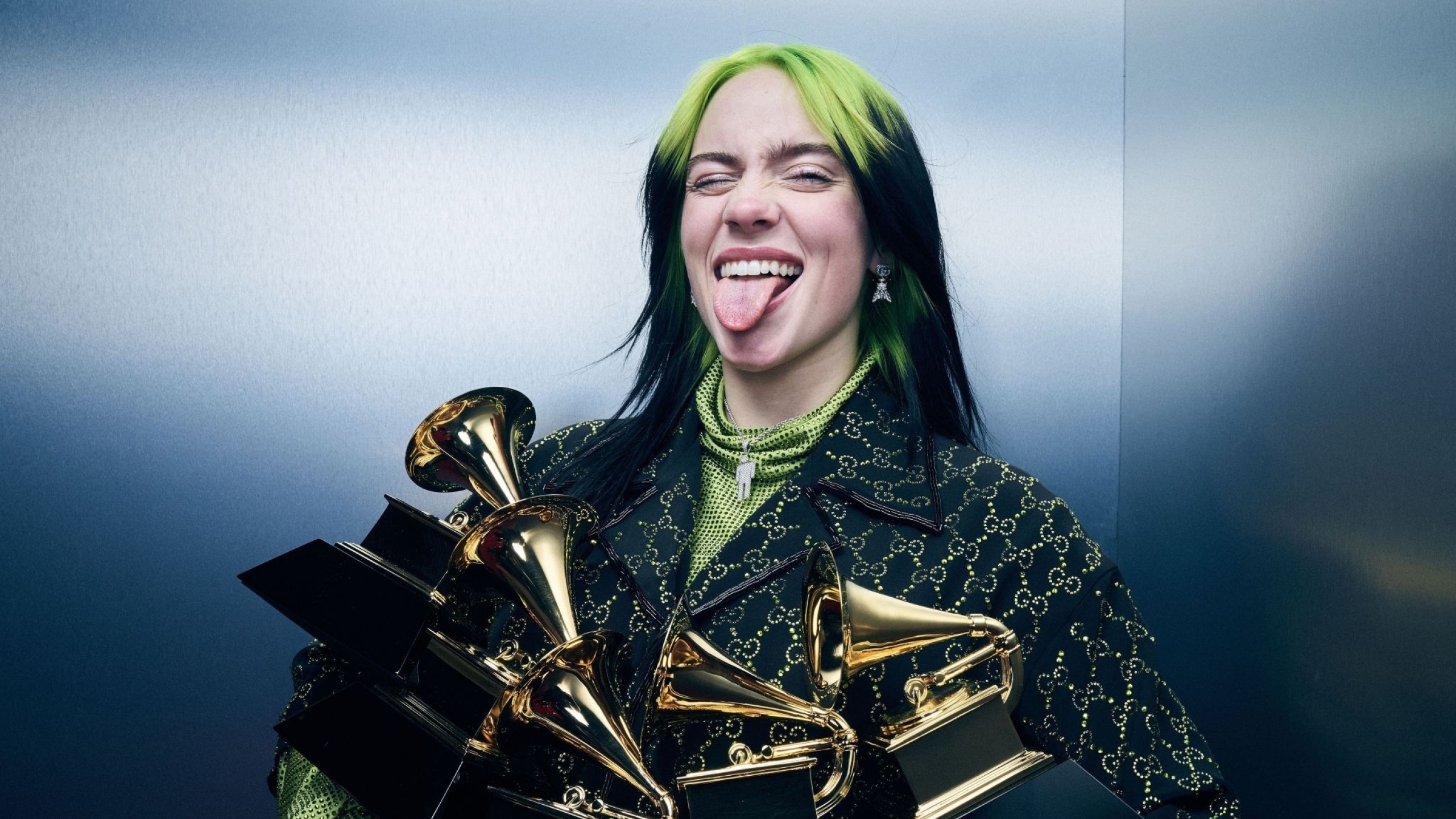 10. Billie Eilish's blue hair and black and green outfit from her "No Time to Die" music video for the James Bond film - wide 6