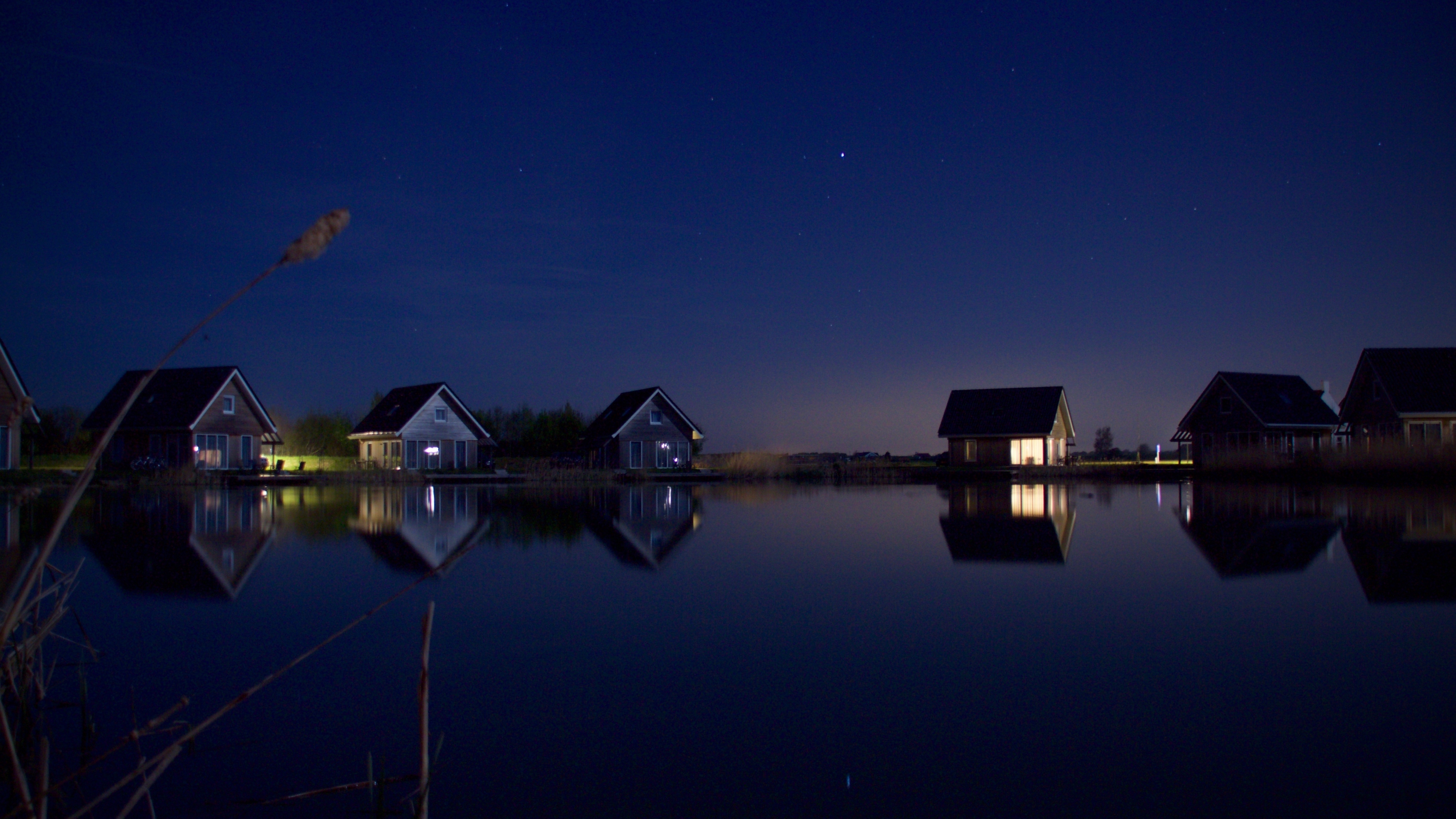 3840x2160 Houses At Lake Water Starry Night 4k Wallpaper Hd Nature 4k