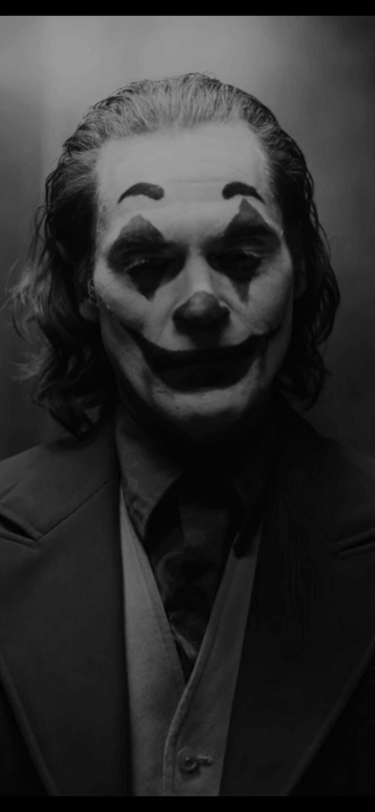 1242x2688 Joaquin Phoenix As Joker Monochrome Iphone Xs Max Wallpaper