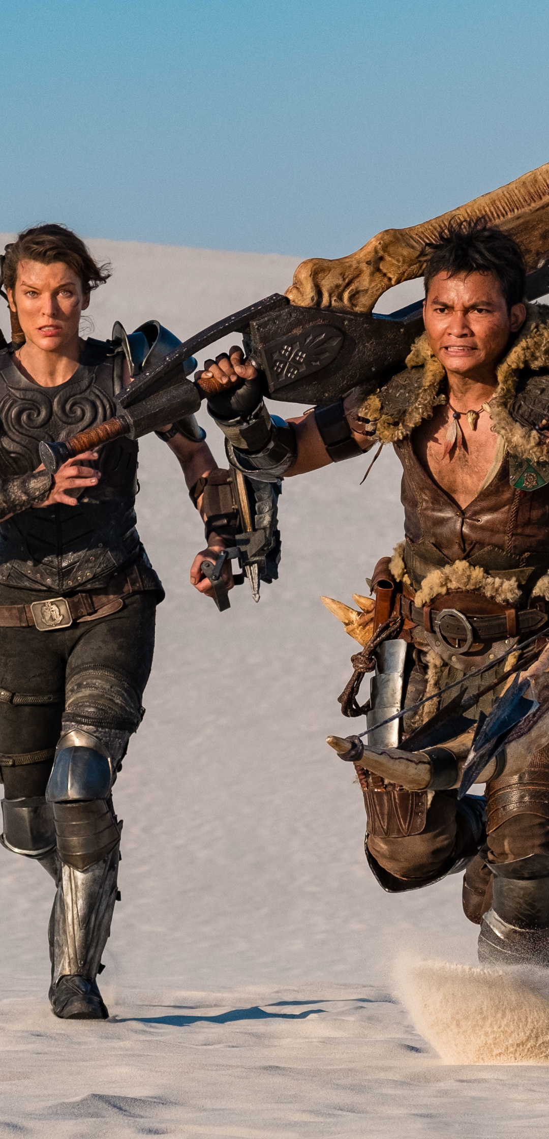 1080x2240 Milla Jovovich and Tony Jaa In Monster Hunter 1080x2240