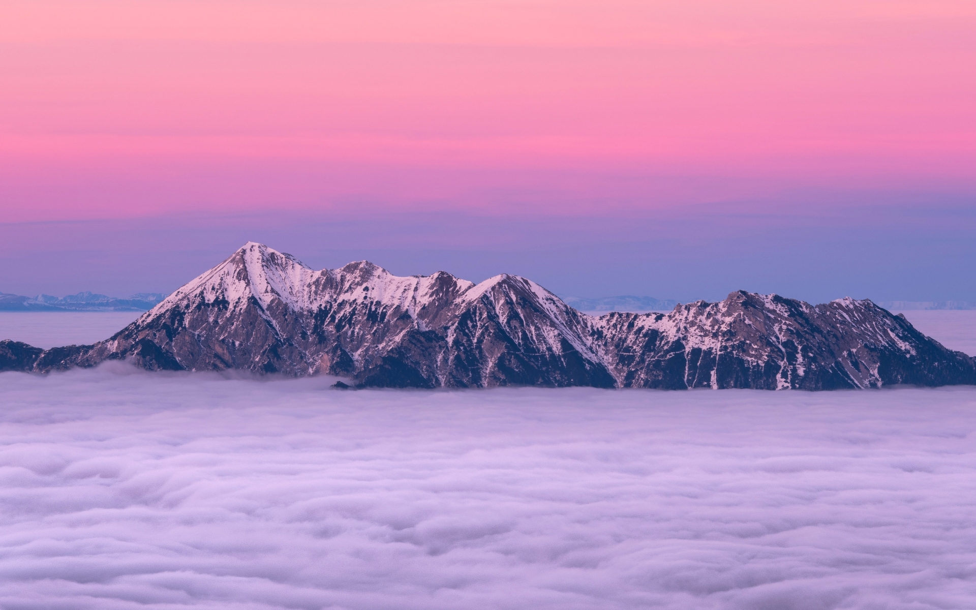 1920x1200 Mountain Peaks Fog And Pink Clouds 1200p Wallpaper Hd Nature
