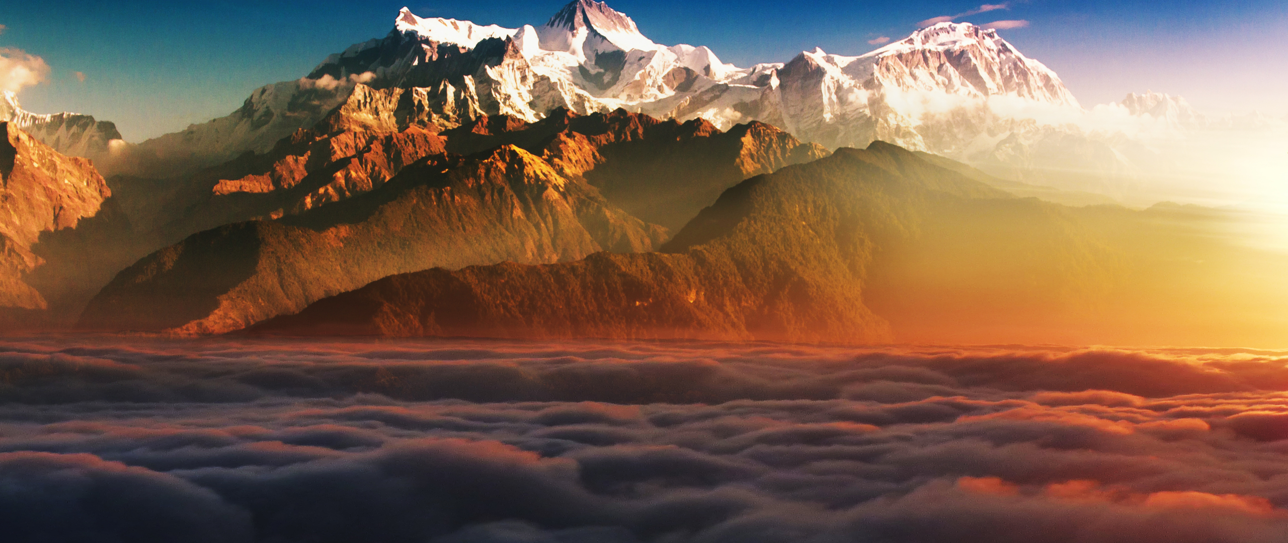 mountains-in-clouds_64418_2560x1080.jpg