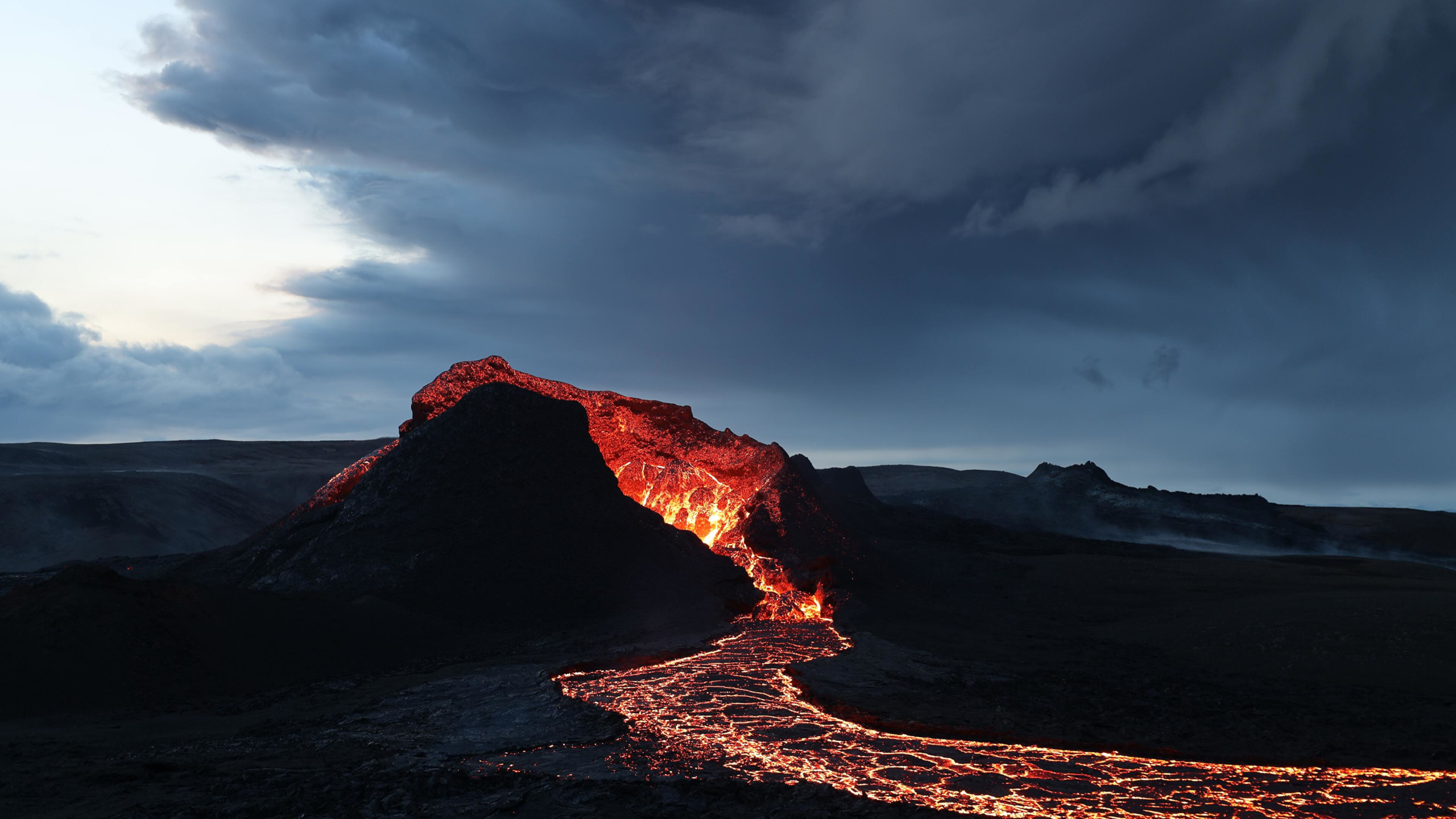 Premium Photo  Image night fire mountain and the wit of the volcanic  landscape high resolution magma river painting wallpaper bright red hot  magma flowing down to the very foot of the
