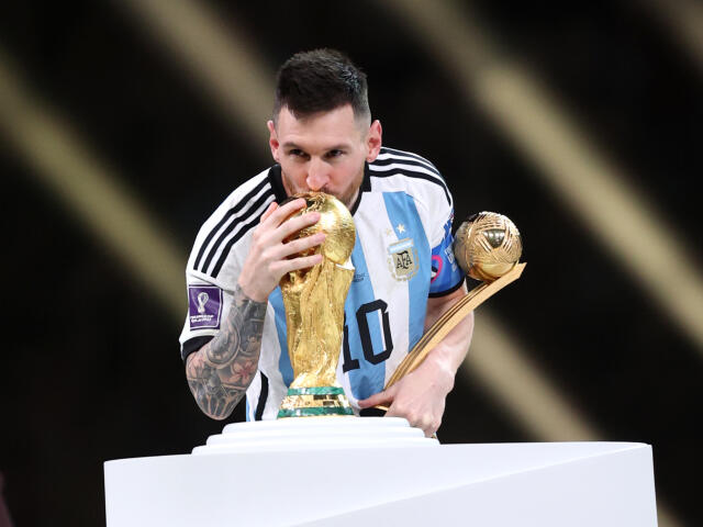 Messi Kiss to FIFA Cup 2022 wallpaper