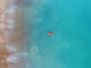 Alone Boat in the Sea wallpaper