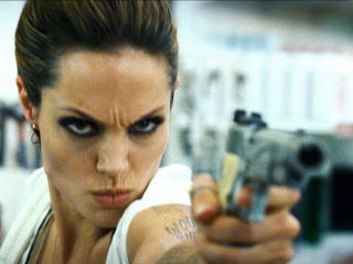Angelina Jolie with gun   wallpaper