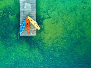 Colorful Kayak Boats wallpaper