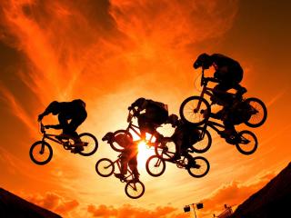 cyclists, sun, sky Wallpaper