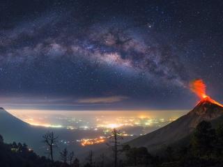 Erupting Volcano with Milky Way as a Back Drop Wallpaper