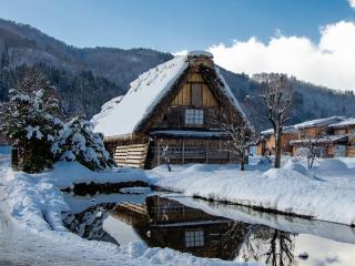 Japan Village Covered in Winter Snow wallpaper