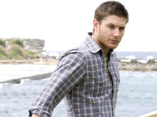 Jensen Ackles On Beach wallpaper