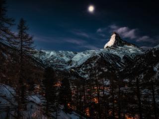 Moon at Pick of Winter Mountains wallpaper
