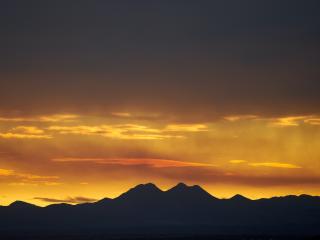 Mountains Silhouette During Sunset wallpaper