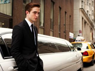 Robert Pattinson in Suit with car Wallpaper