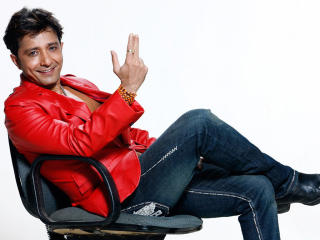 Sukhwinder Singh In Red Jacket Photos wallpaper