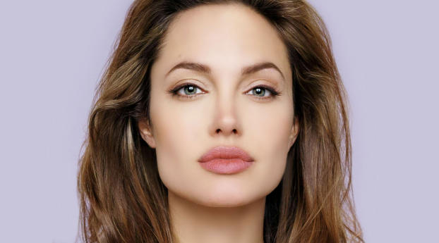 Angelina Jolie Charming Photos Wallpaper 1360x768 Resolution