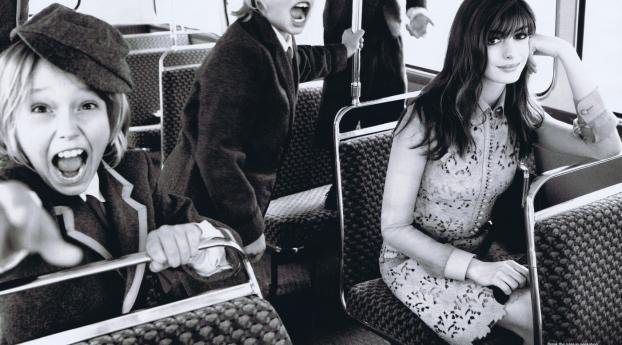 Anne Hathaway In Bus Photoshoot Wallpaper 1440x2992 Resolution