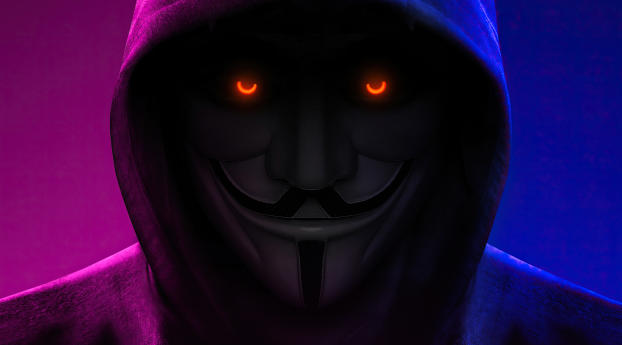Anonymous with Orange Eyes Wallpaper 1125x2436 Resolution