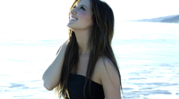 Ashley Tisdale At Beach Pics Wallpaper 1080x2340 Resolution