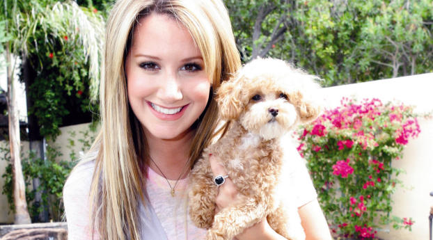 Ashley Tisdale With Dog Photos Wallpaper 1360x768 Resolution