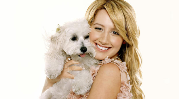 Ashley Tisdale With Dog Pics Wallpaper 1336x768 Resolution