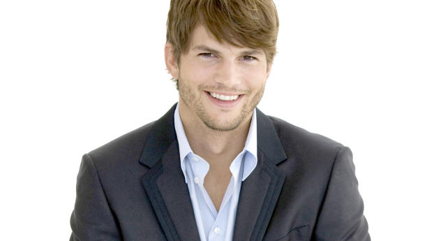 Ashton Kutcher Smiling Pose in Suit wallpaper Wallpaper 2048x1152 Resolution