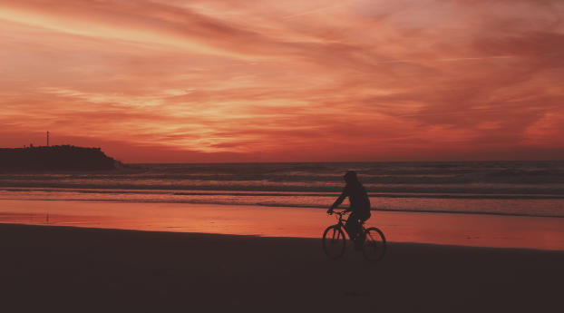 bicyclist, sea, shore Wallpaper 1366x768 Resolution