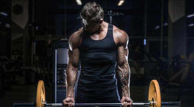 Bodybuilder Man with Tatoo Wallpaper 2560x1080 Resolution