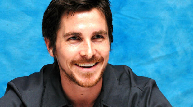 Christian Bale Smile Wallpaper  Wallpaper 1336x768 Resolution