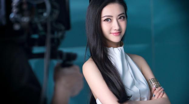  Cute Jing Tian in White Dress Wallpaper 1336x768 Resolution