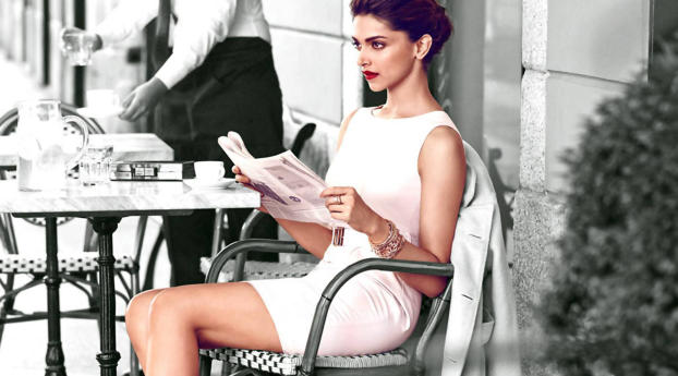Deepika Padukone Reading  Wallpaper 320x480 Resolution