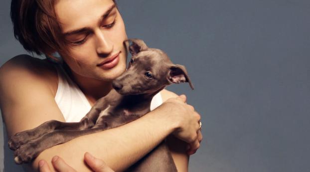 douglas booth, actor, dog Wallpaper 1336x768 Resolution