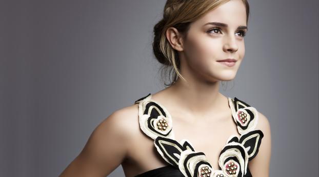 Emma Watson Smile Pose Wallpaper 240x320 Resolution