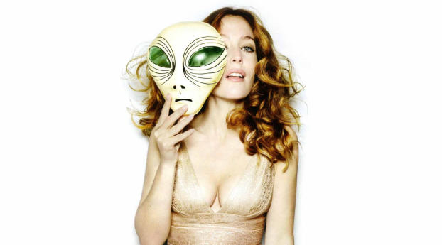 Gillian Anderson with Mask Wallpaper 320x480 Resolution