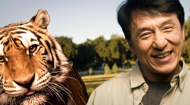 Jackie Chan With Tiger Wallpaper 1125x2436 Resolution