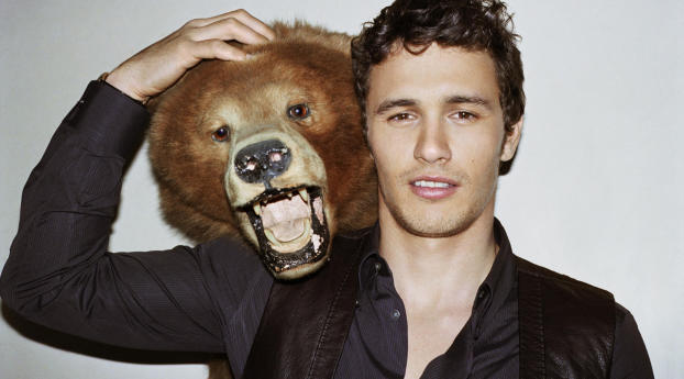 James Franco With Bear Wallpaper 1336x768 Resolution