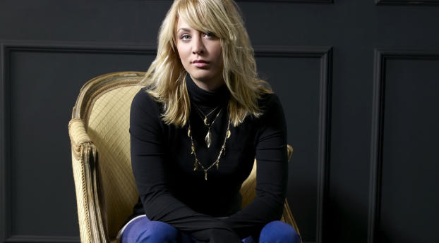 Kaley Cuoco On Chair Images Wallpaper 240x320 Resolution