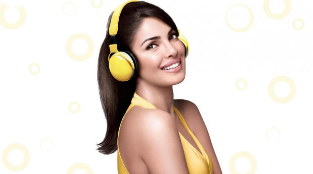 Priyanka Chopra In Yellow  Wallpaper 240x320 Resolution