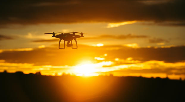 quadrocopter, sunset, sky Wallpaper 320x568 Resolution