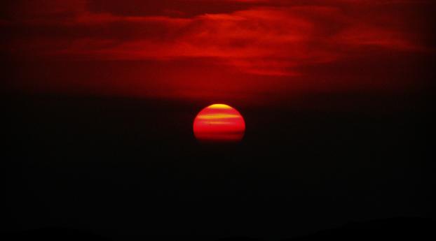 Red Sunset And Dark Clouds Wallpaper 1536x2048 Resolution