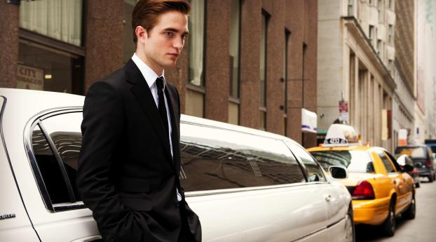 Robert Pattinson in Suit with car Wallpaper 1400x900 Resolution
