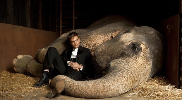 Robert Pattinson With Elephant wallpaper Wallpaper 360x640 Resolution