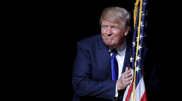 Smiling Donald Trump with US Flag Wallpaper 2340x1080 Resolution