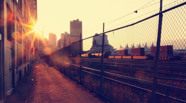 sunset, railroad,  city Wallpaper
