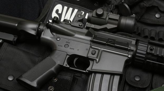 swat, submachine gun, bulletproof vest Wallpaper 2560x1024 Resolution