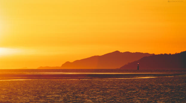 Yellow Sunset Near Lighthouse Wallpaper 480x854 Resolution